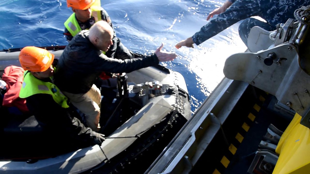 An image made available by the Egyptian military spokesperson's Facebook page on November 27, 2024 shows rescue efforts after a diving boat capsized in the Red Sea off Egypt's coast.(AFP)