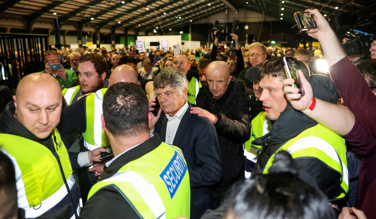Gerry Hutch uses a phone at a count centre following Ireland's general election, in Dublin, Ireland, December 1, 2024. (REUTERS)