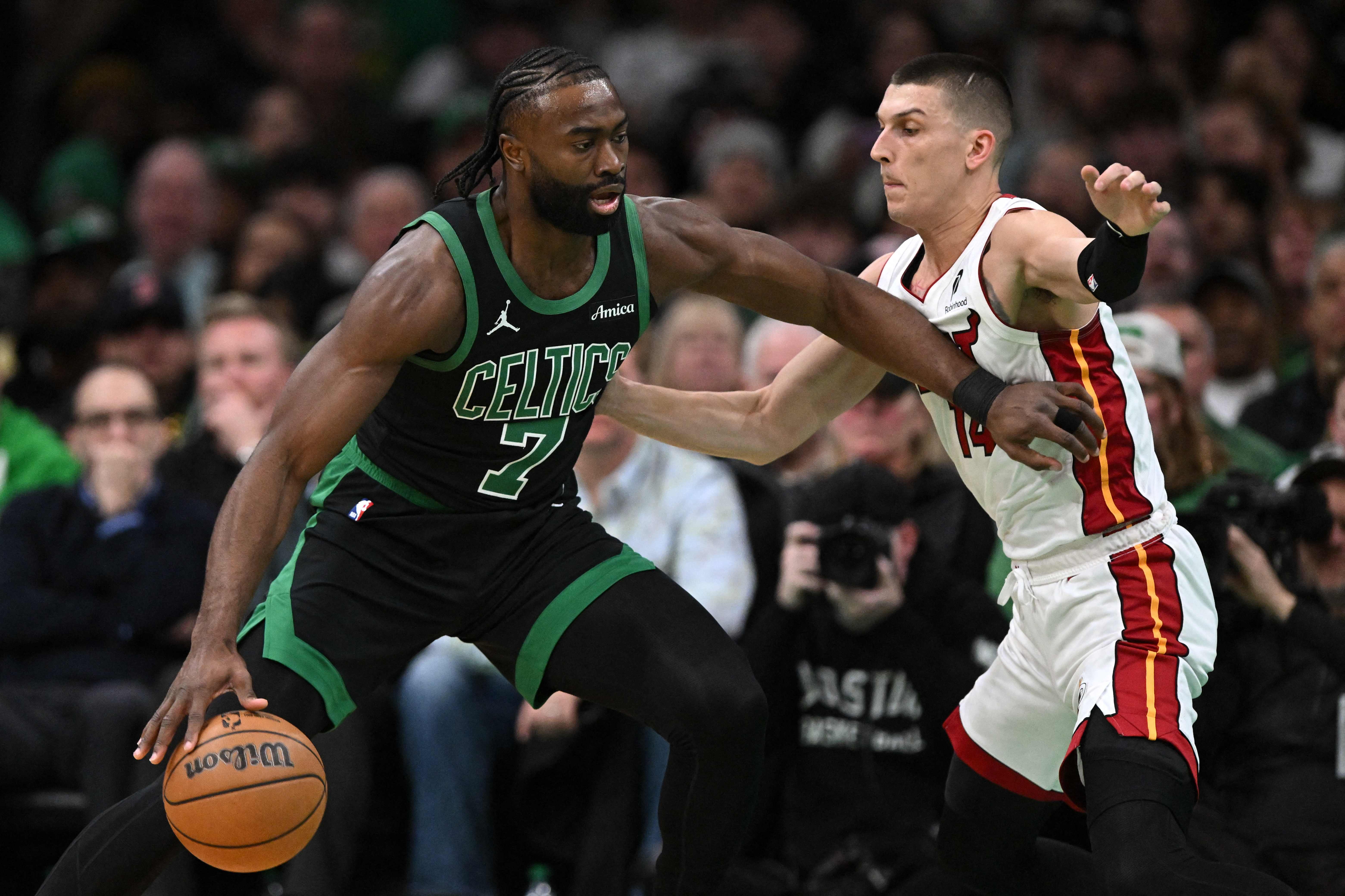 Jaylen Brown of the Boston Celtics dribbles the ball to the basket against Tyler Herro of the Miami Heat during the first quarter of an NBA game at the TD Garden on Dec. 02, 2024 in Boston, Massachusetts. (Getty Images via AFP)