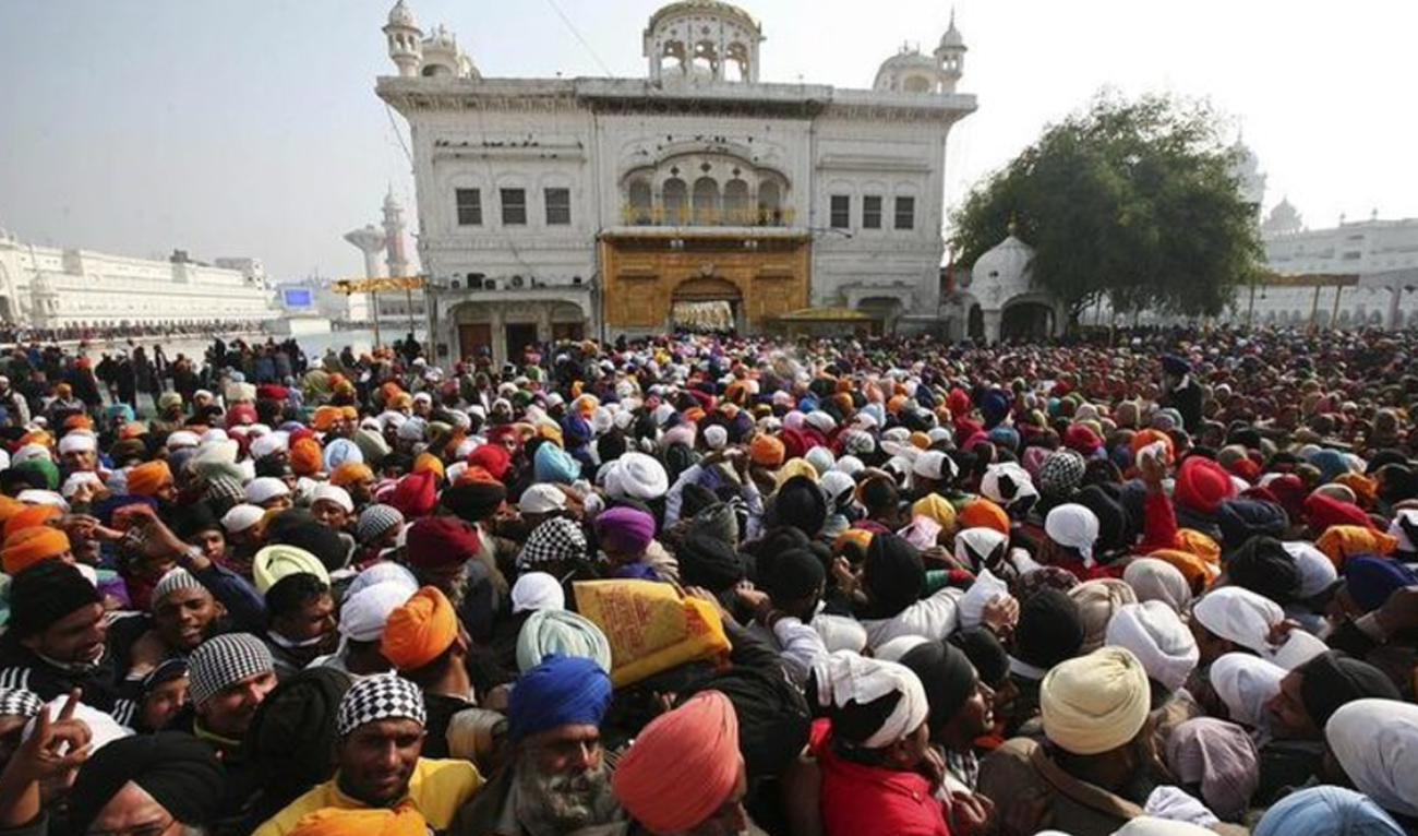 In this file photo, taken on January 1, 2014, devotees throng the holy Sikh shrine of Golden Temple to offer prayers for the New Year, in the northern Indian city of Amritsar. (REUTERS/File)