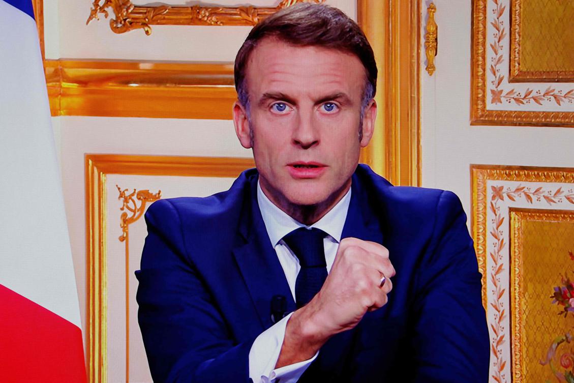 French President Emmanuel Macron addresses the nation during a televised broadcast from the Elysee Palace. (AFP)