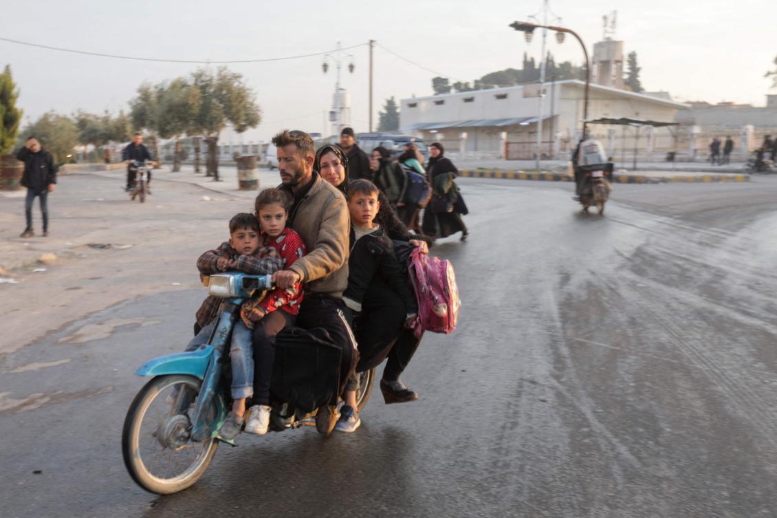The Syrian Observatory for Human Rights, a UK-based monitoring group, said thousands of people had begun fleeing on Thursday night toward Syria’s western coastal regions. (AFP)