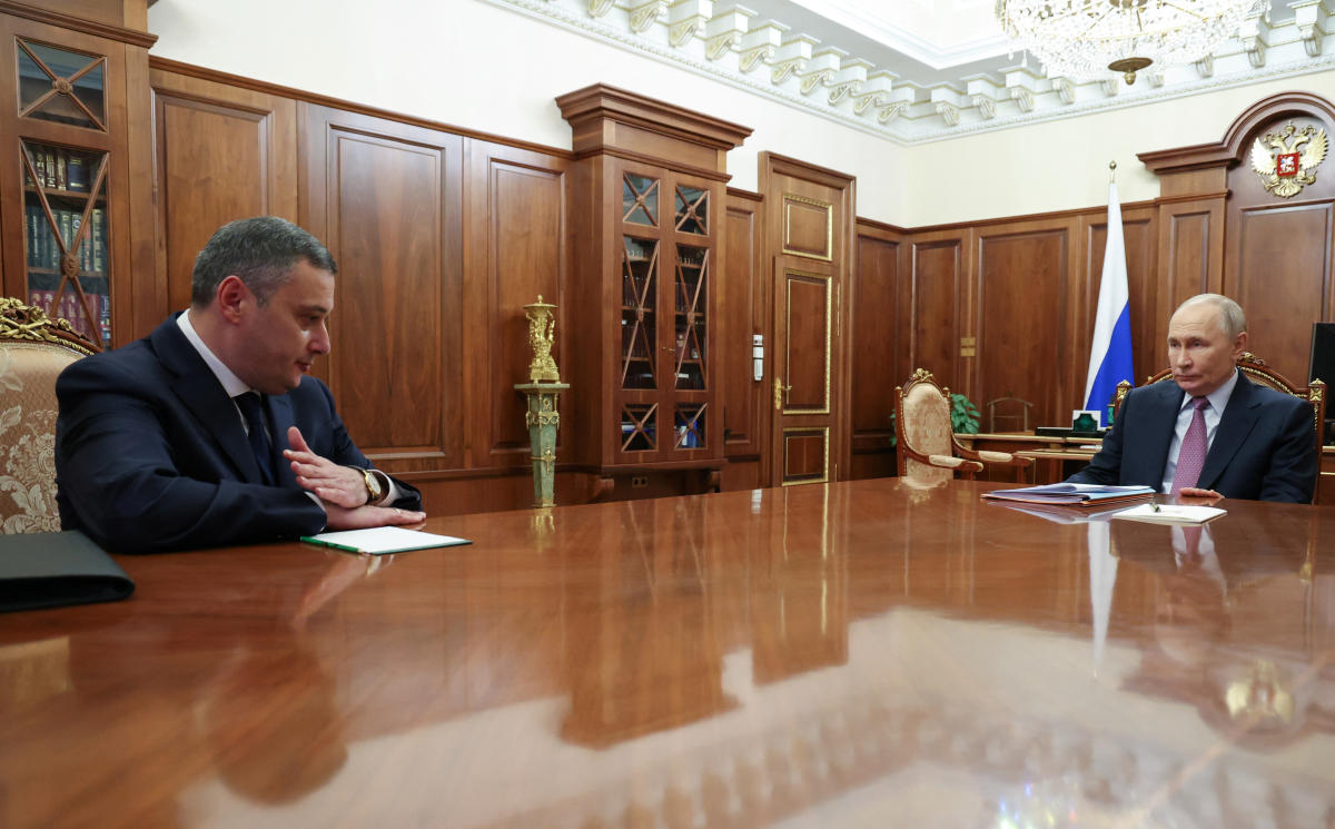 Russia’s President Vladimir Putin meets with parliamentarian Alexander Khinshtein to appoint him as the acting governor of the Kursk region at the Kremlin in Moscow, on Dec. 5, 2024. (Reuters)
