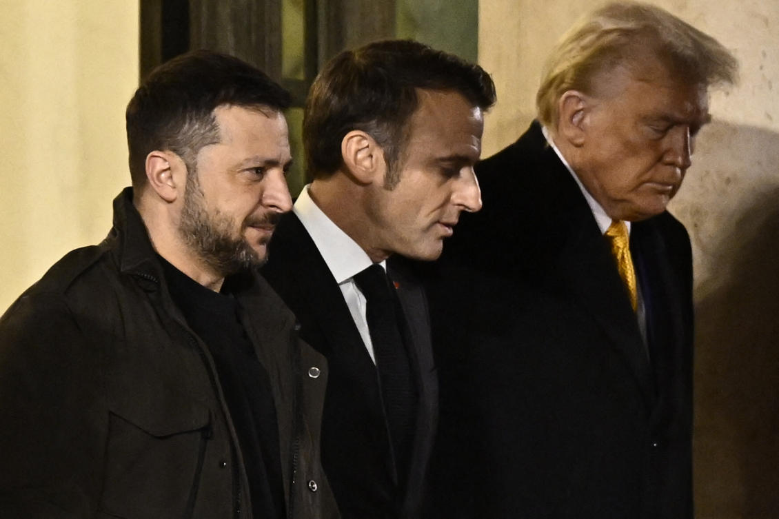 France’s President Emmanuel Macron (C) walks with US president-elect Donald Trump (R) and Ukraine’s President Volodymyr Zelensky (L) after a meeting at the Elysee Presidential Palace in Paris on December 7, 2024. (AFP)