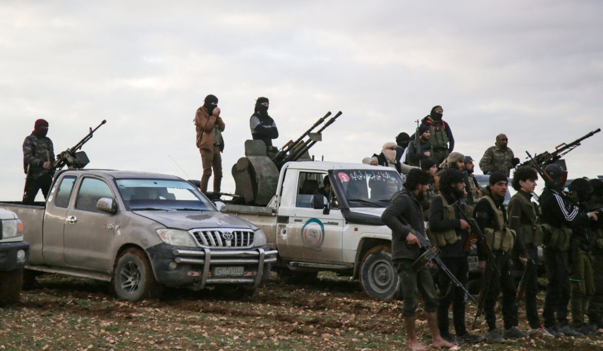 Turkish-backed Syrian fighters gather with their vehicles at a position near the northern Syrian town of Manbij. (AFP file photo)