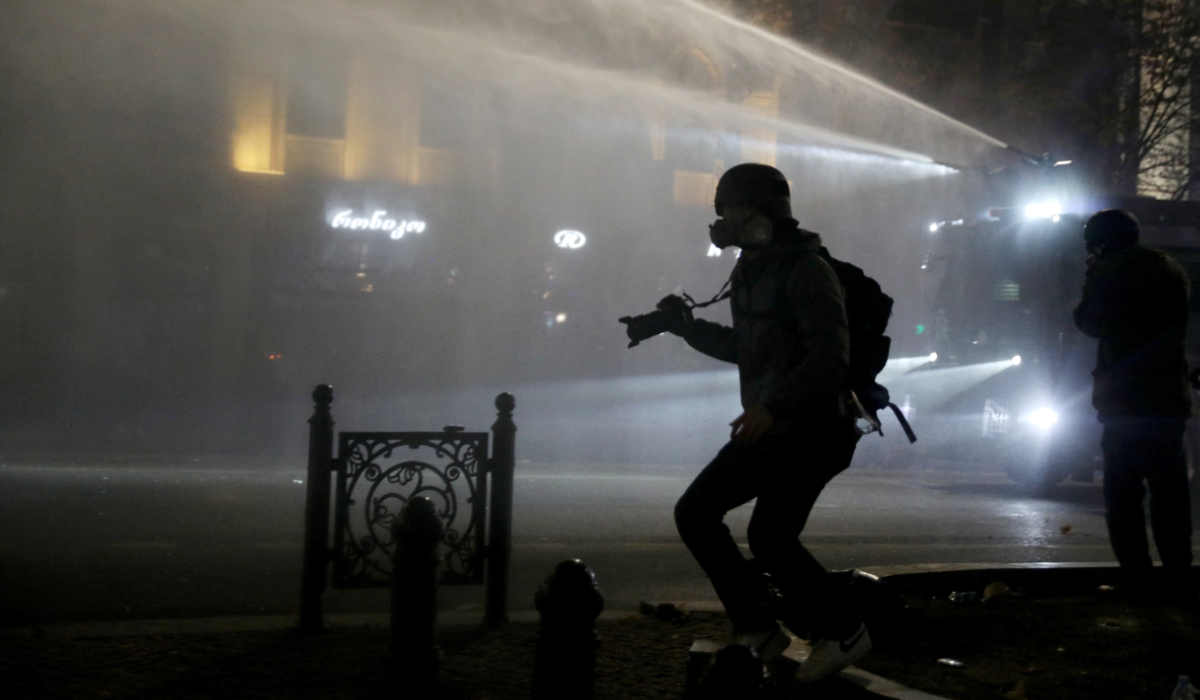 Georgian journalists allege brutal beatings as protests rage against ending EU talks