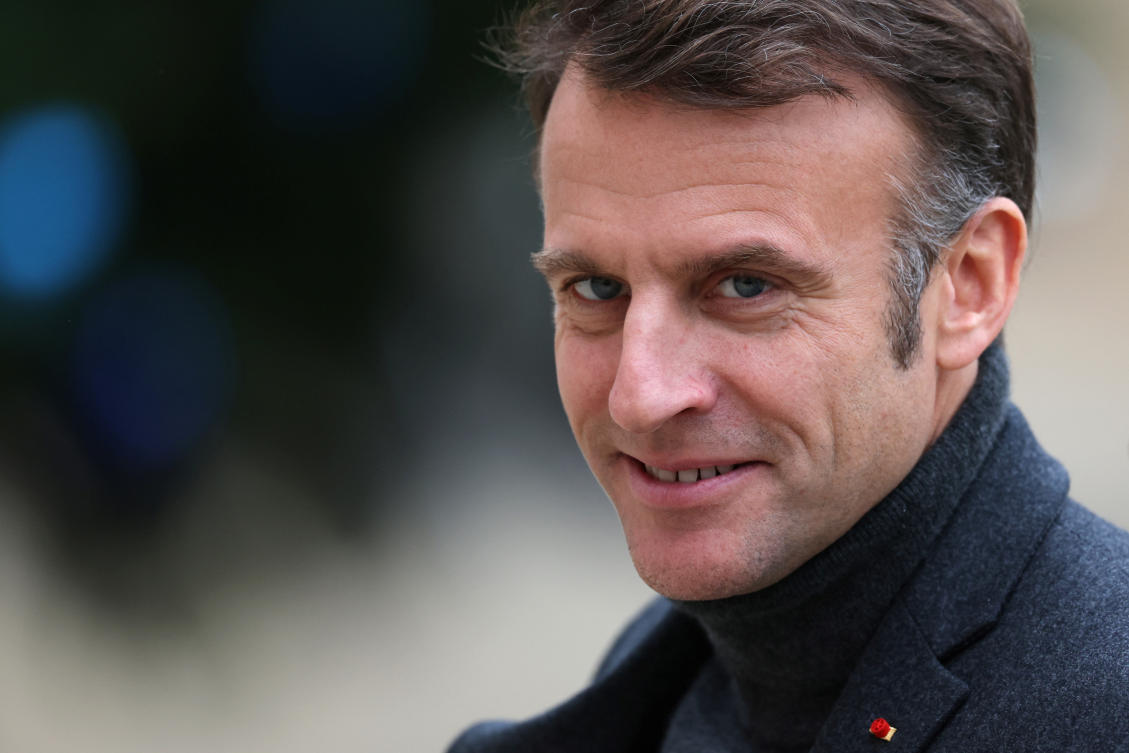 French President Emmanuel Macron welcomes a guest at the Elysee Palace in Paris, France, December 9, 2024. (Reuters)