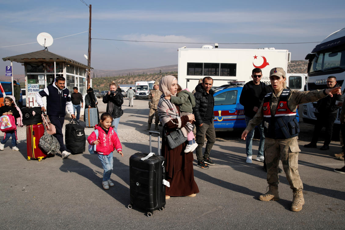 Syrian migrants arrive at the Cilvegozu border gate to cross into Syria, after Syrian militants announced that they have ousted Syria’s Bashar Assad, in the Turkish town of Reyhanli in Hatay province, Turkiye, Dec. 10, 2024. (Reuters)