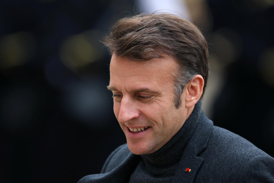 French President Emmanuel Macron welcomes a guest at the Elysee Palace in Paris, France, December 9, 2024. (Reuters)