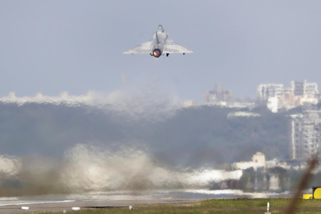 Above, a Taiwanese fighter jet takes off at an air base in Hsinchu on Dec. 10, 2024. Taiwan lives under the constant threat of invasion by China, which has not ruled out using force to bring the island under its control. (AP)