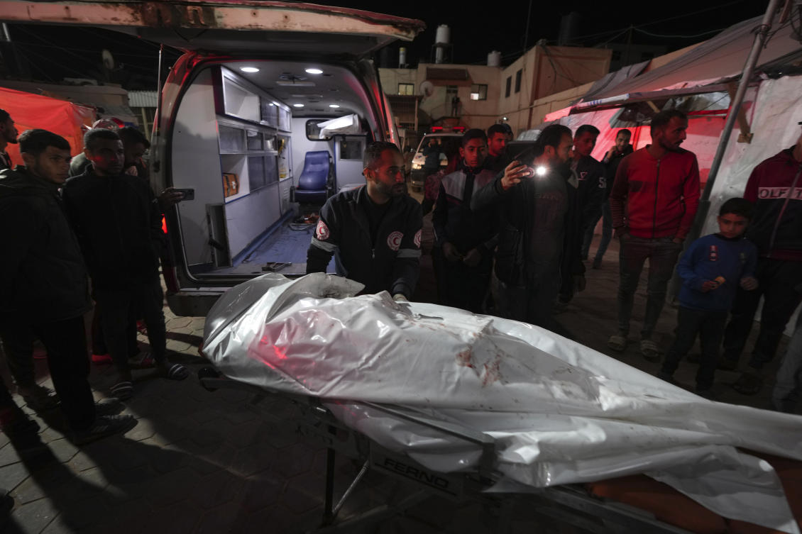 Earlier on Thursday, two Israeli strikes in southern Gaza killed 13 Palestinians who Gaza medics and Hamas said were part of a force protecting humanitarian aid trucks. (AP)