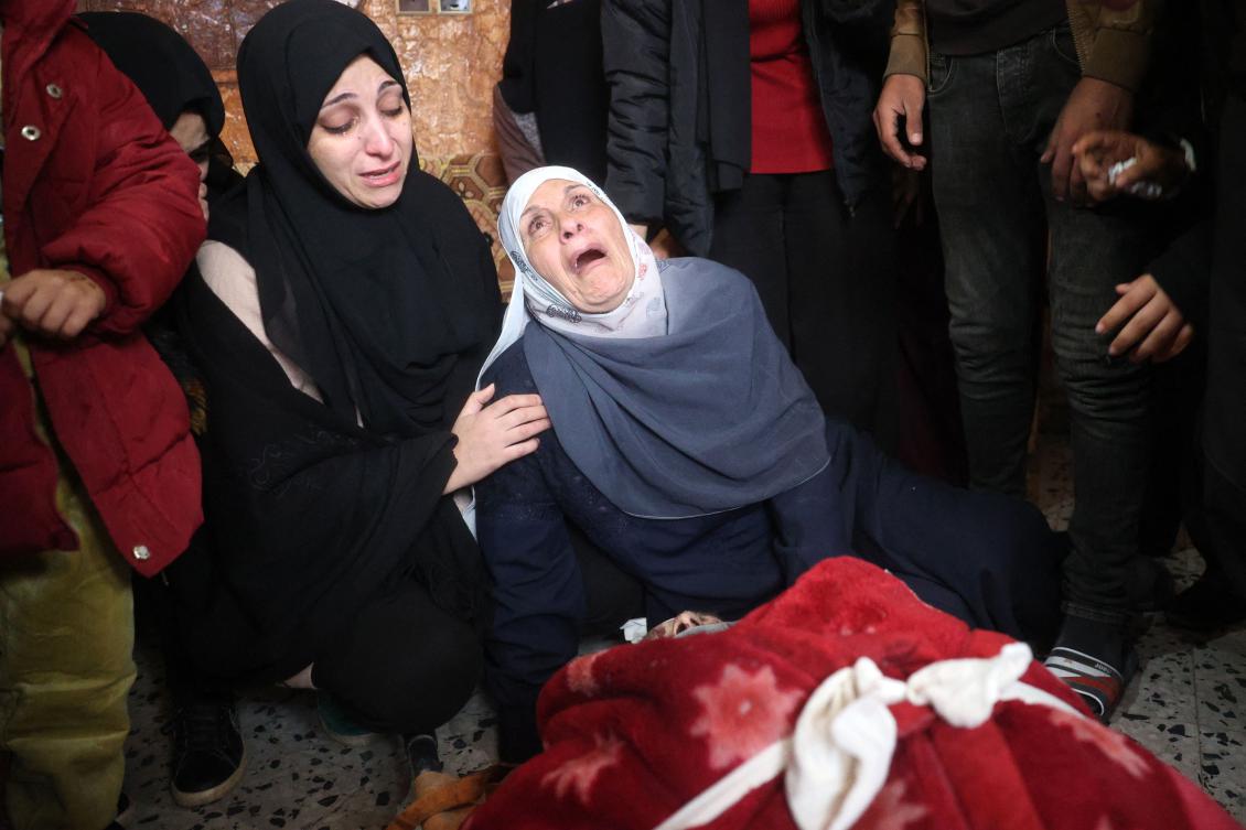 Palestinians mourn relatives, killed in an Israeli airstrike amid the continuing war between Israel and Palestinian militants. (AFP)