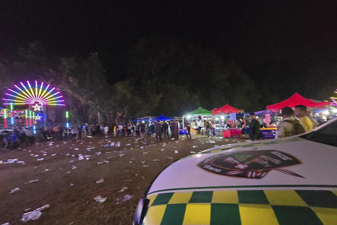 Above, the site where an explosive device was thrown into a crowd during an annual festival Umphang, Tak province in Thailand on Dec. 13, 2024. (Umphang Rescue via AP)