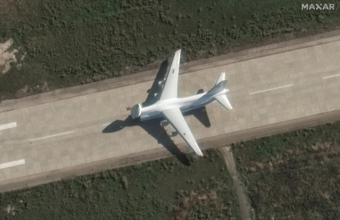 A satellite image shows an An-124 heavy transport aircraft with its nose cone lifted, at the Russian Khmeimim airbase, near Latakia, Syria, December 13, 2024. (Maxar Technologies/Handout via Reuters)