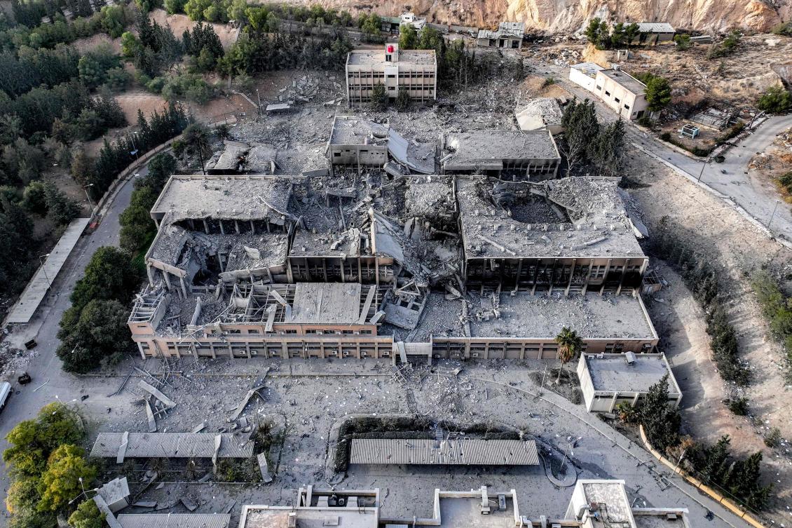 This aerial view shows the aftermath of an overnight strike attributed to Israel on the Barzeh scientific research center affiliated with the Syrian defense ministry in northern Damascus on December 10, 2024. (AFP)