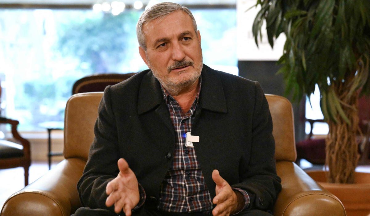 Syrian rebel leader and founder of the Free Syrian Army (FSA) Riad al-Asaad speaks during an interview with AFP in the capital Damascus on December 15, 2024. (AFP)