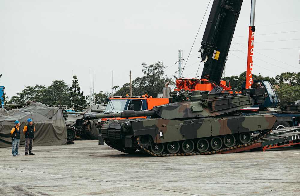 A US-made M1A2 Abrams battle tank rolls down from a trailer at an army armor training center in Hsinchu County, Hsinchu on Dec. 16, 2024. (Taiwan’s Ministry of National Defense/AFP)