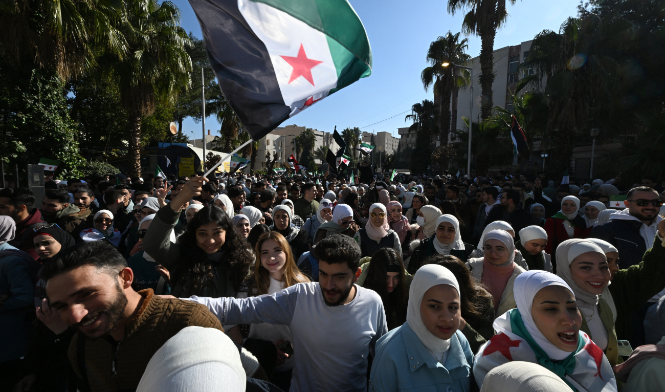 Syrian students attend a march near the campus of the Damascus University in the Syrian capital on December 15, 2024. (AFP/File)