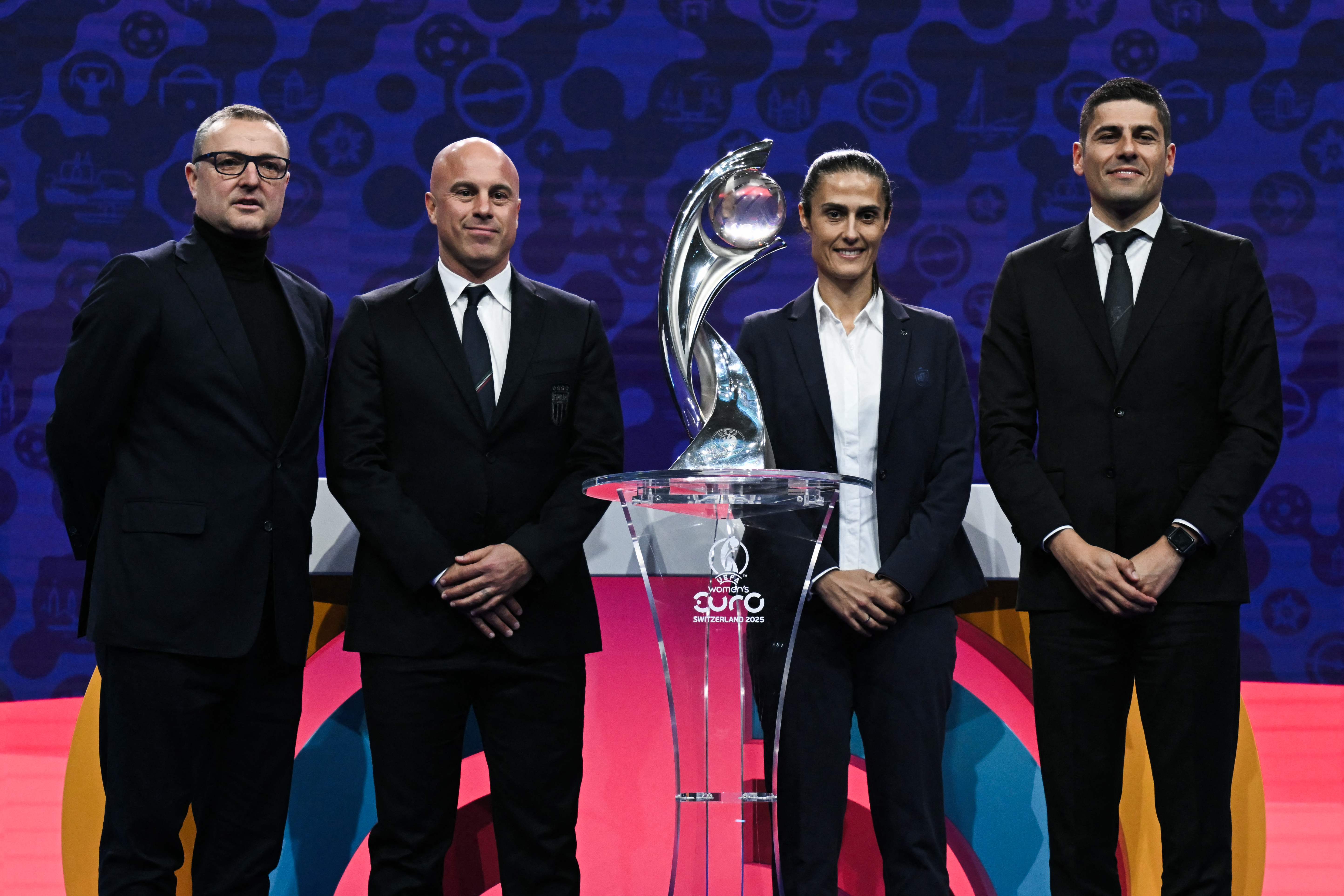 (From left) Belgium’s head coach Ives Serneels, Italy’s head coach Andrea Soncin, Spain’s head coach Montse Tome and Portugal’s head coach Francisco Neto pose with the trophy during the draw for UEFA Women’s Euro 2025 in Lausanne, on Dec.16, 2024. (AFP)