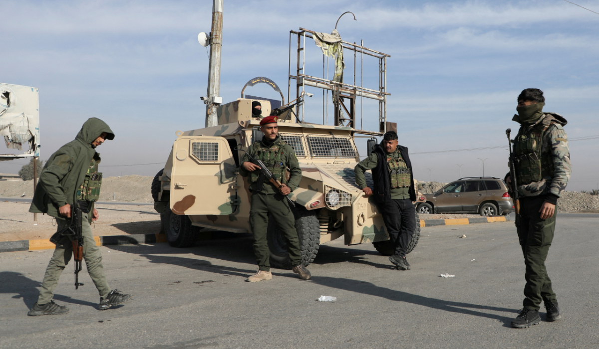 Members of Kurdish-led Syrian Democratic Forces (SDF) stand along a street, after rebels seized the capital and ousted Syria's Bashar al-Assad, in Hasakah, Syria December 11, 2024. (REUTERS)