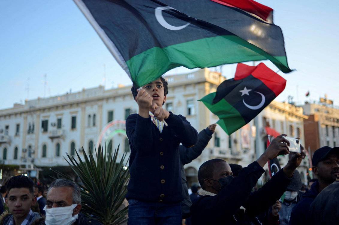 A boy celebrates the anniversary of the 2011 revolution in Tripoli, Libya. (File/Reuters)