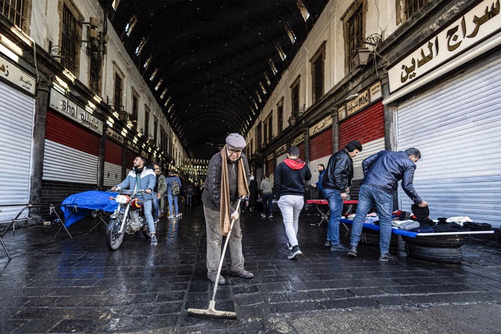 Many locals brought their own cleaning equipment to the Old City of Damascus and other areas, while civil society leaders mobilized public support through social media. (AFP)