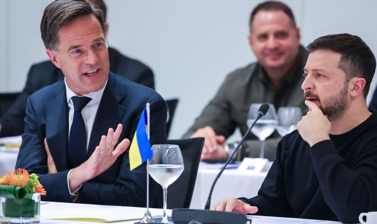 NATO Secretary General Mark Rutte (L) speaks next to Ukraine's President Volodymyr Zelensky during a NATO-Ukraine Council Working Dinner attended by North Atlantic Treaty Organisation (NATO) Defense Ministers at the NATO Headquarters in Brussels on October 17, 2024. (AFP)