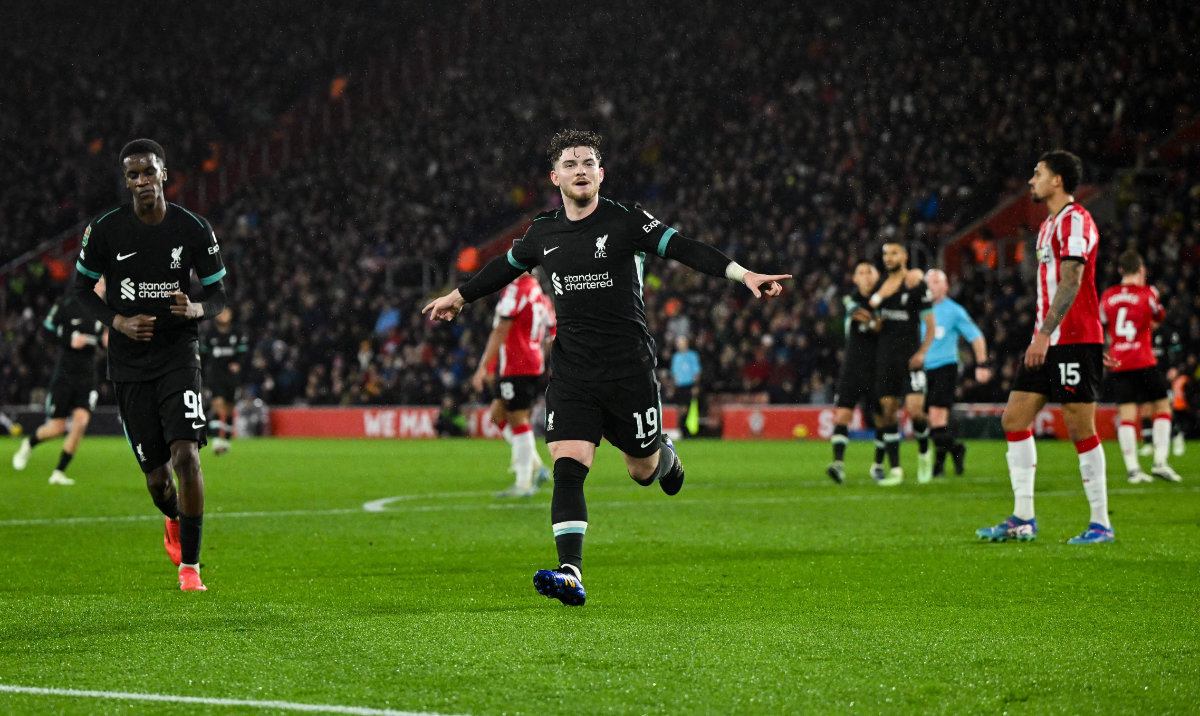 Liverpool's English midfielder #19 Harvey Elliott celebrates after scoring his team second goal during the English League Cup quarter-final football match between Southampton and Liverpool at St Mary's Stadium in Southampton, southern England, on December 18, 2024. (AFP)