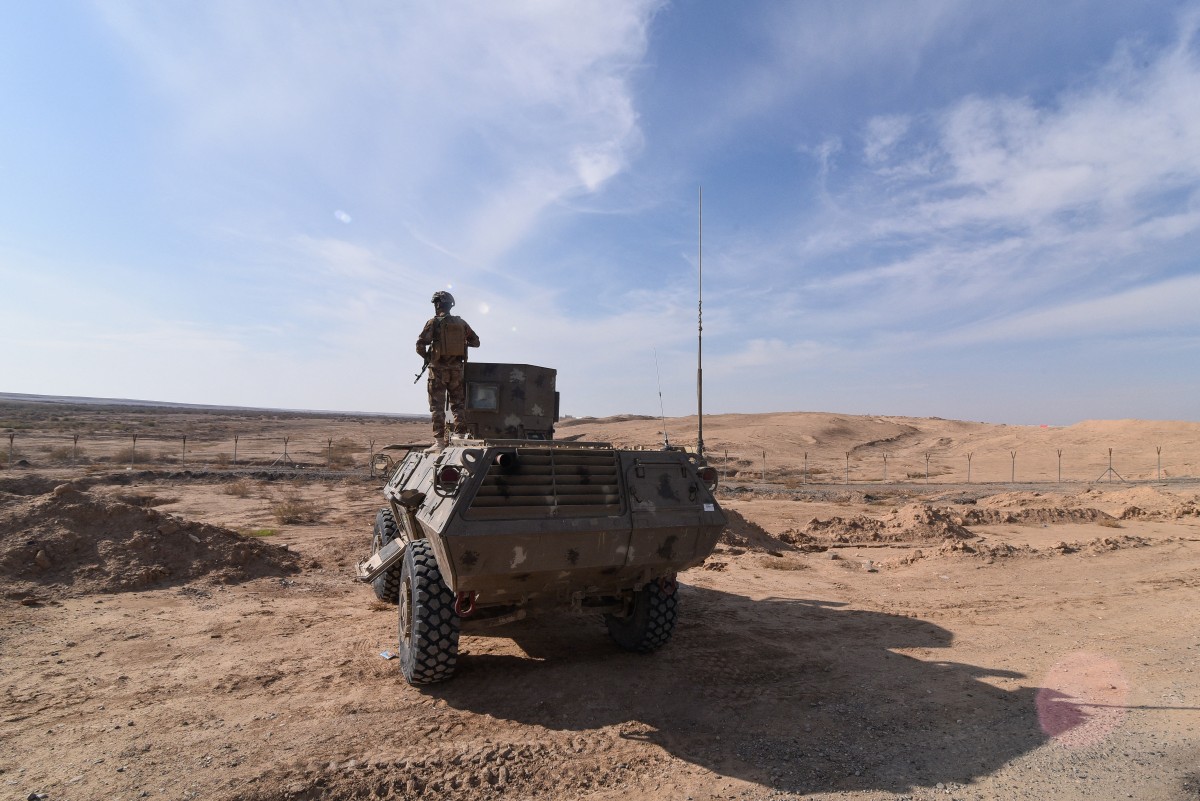 members of a joint Hashed and Iraqi army force standing guard at the Iraqi-Syrian border on December 5, 2024. (File/AFP)