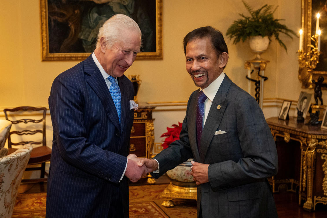 King Charles III meets with the Sultan of Brunei, Hassanal Bolkiah, in the 18th Century room at Buckingham Palace in London. (File/Reuters)