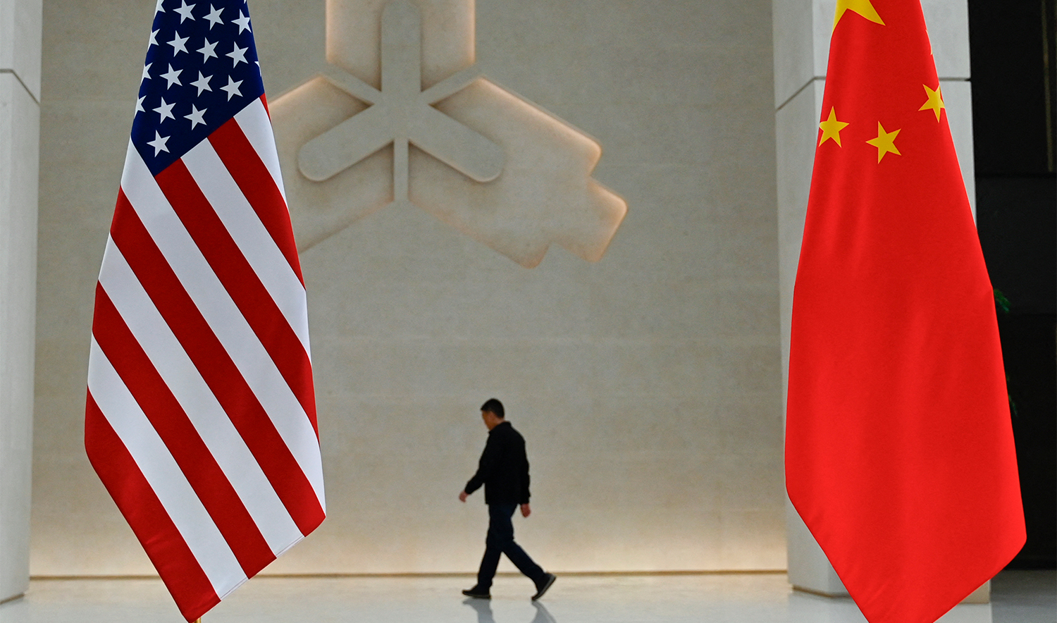 The US and China flags are seen at the People's Bank of China prior to the arrival of US Treasury Secretary Janet Yellen to the central bank's headquarters in Beijing on April 8, 2024. (AFP/File)