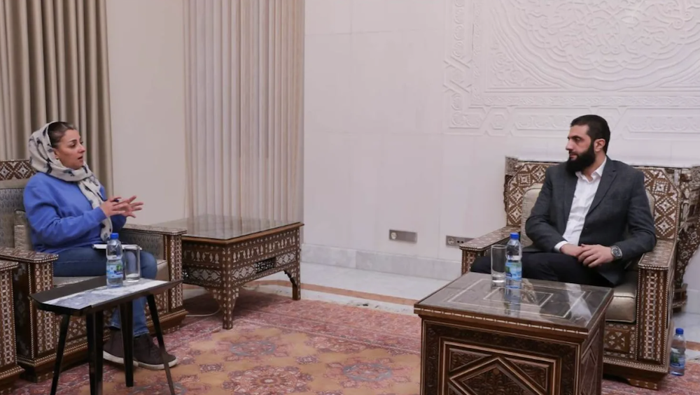 Asharq Al-Awsat journalist Bissane El-Chiekh interviewing Al-Sharaa. (Asharq Al-Awsat)