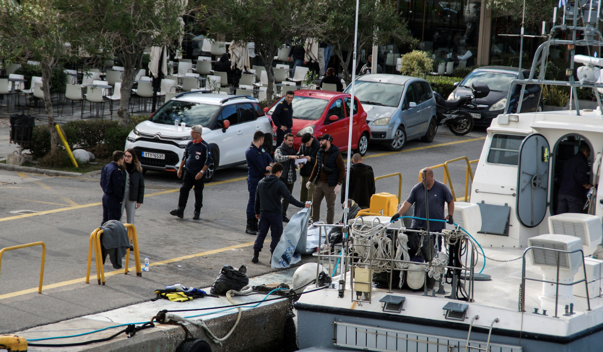 Paramedics and coast guard officers transfer the bodies of migrants following a collision off the island of Rhodes, Greece, December 20, 2024. (REUTERS)