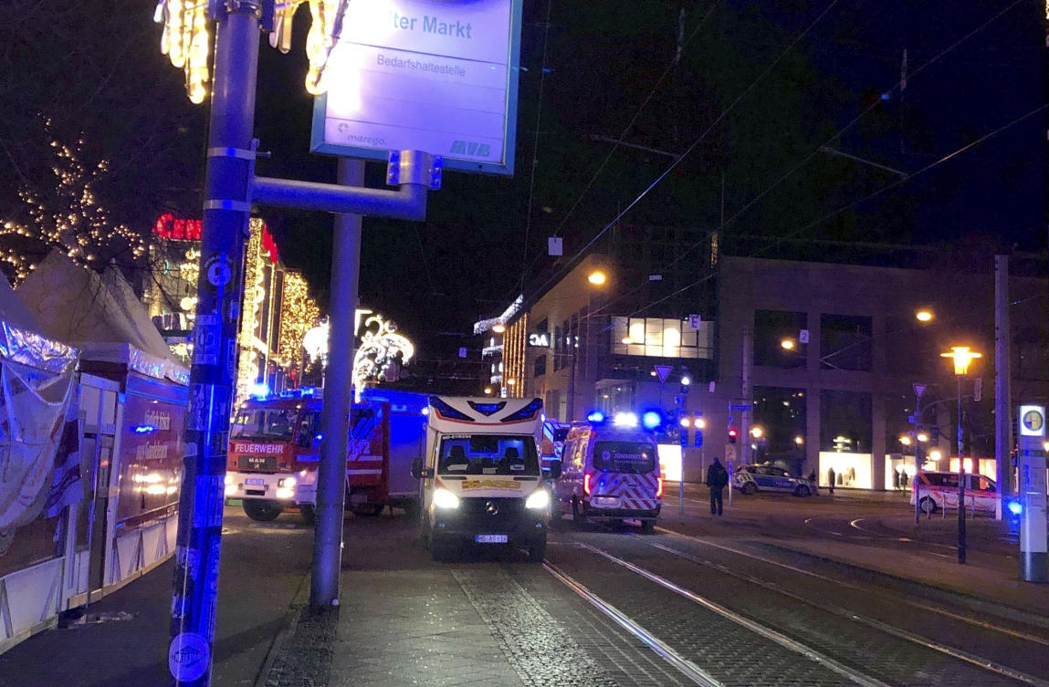 Emergency services attend an incident at the Christmas market in Magdeburg, Germany. (dpa via AP)
