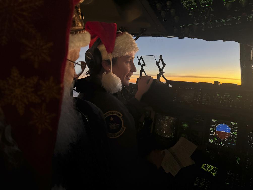 Santa and Mrs. Claus use military transports to bring Christmas to an Alaska Native village