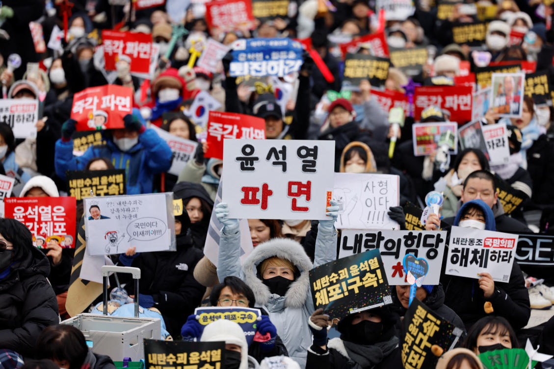 Protesters attend a rally against South Korea’s impeached President Yoon Suk Yeol, who declared martial law, in Seoul on Dec. 21, 2024. (Reuters)