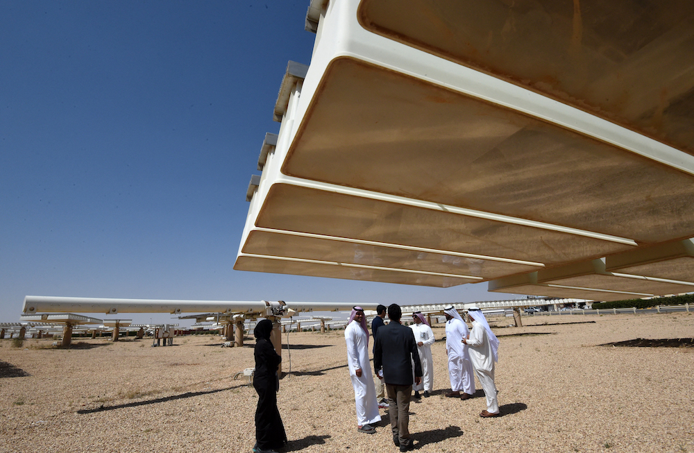 Saudi Arabia’s National Renewable Energy Program sees the Kingdom aiming for a solar energy capacity of 40 gigawatts by 2030. Above, the solar plant in Uyayna, north of Riyadh on March 29, 2018. (AFP file photo)