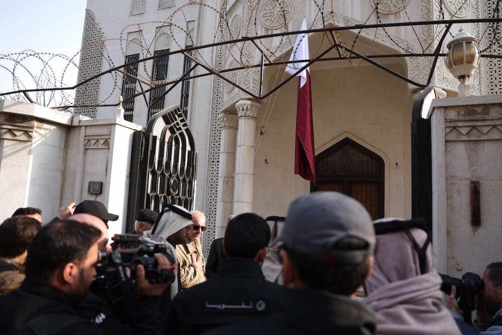 Members of the Qatari diplomatic delegation arrive for the official reopening of the embassy in Damascus on Dec. 21, 2024. (AFP)