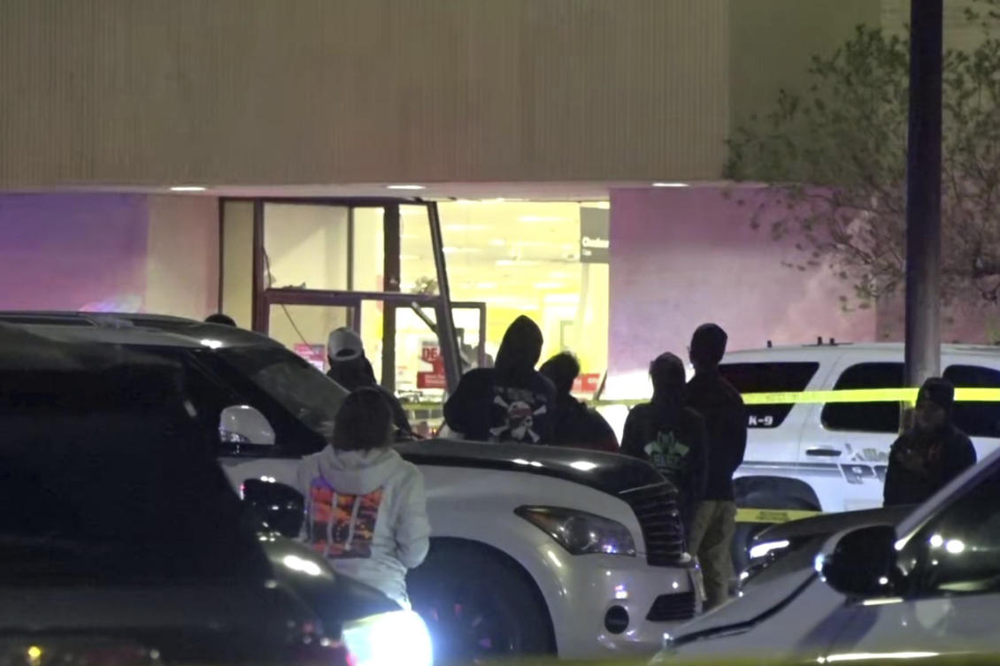 Police respond to a JCPenney at a shopping mall as people look on Dec. 21, 2024 in Killeen, Texas. (KXXV via AP)