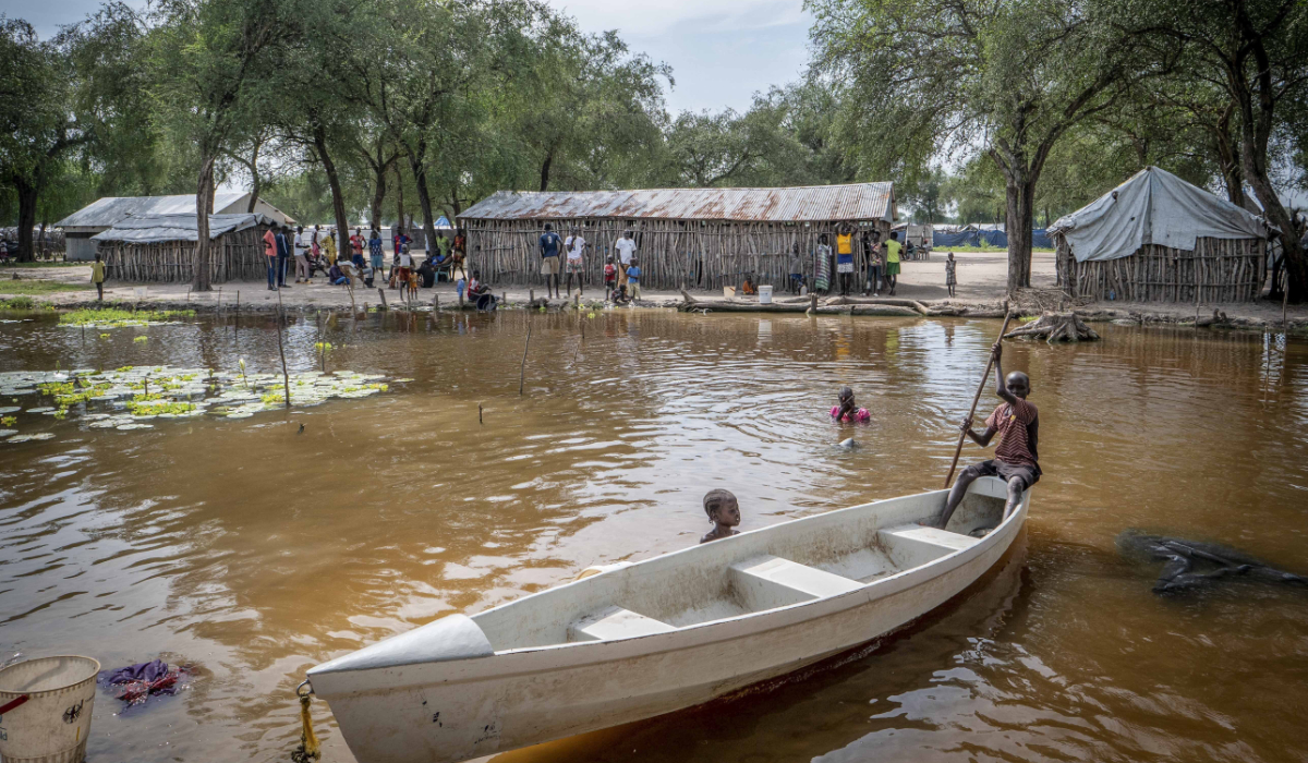 Children ride in a small canoe around the area where they live in Jonglei state, South Sudan, Thursday, Nov. 14, 2024. (AP)