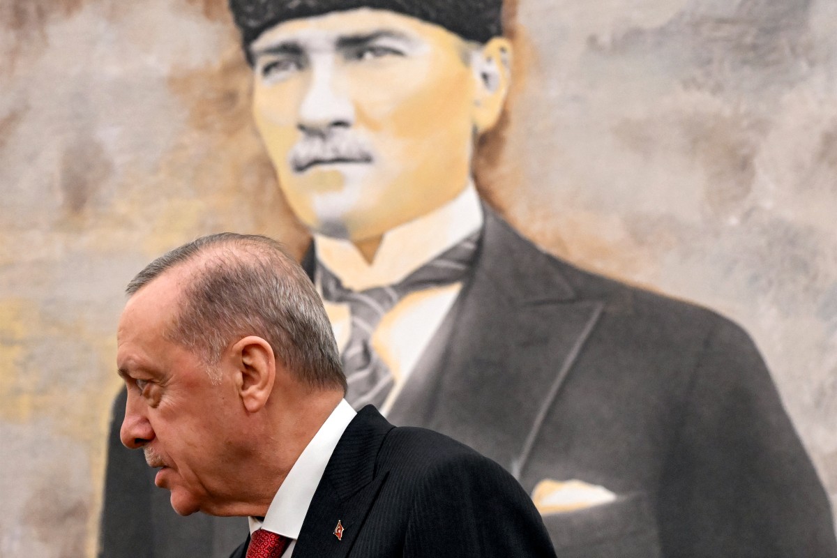 Turkey's President Recep Tayyip Erdogan stands before a picture of the founder and first president of the Turkish Republic Mustafa Kemal Ataturk, during his meeting with the visitig US Secretary of State at Ankara Esenboga Airport on December 12, 2024. (File/AFP)