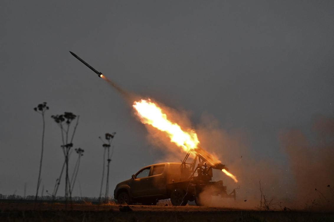Members of the artillery unit of the special rifle battalion of Zaporizhzhia region police fire a small multiple launch rocket system (MLRS) towards Russian troops in a front line, amid Russia's attack on Ukraine, in Zaporizhzhia region, Ukraine. (File/Reuters)