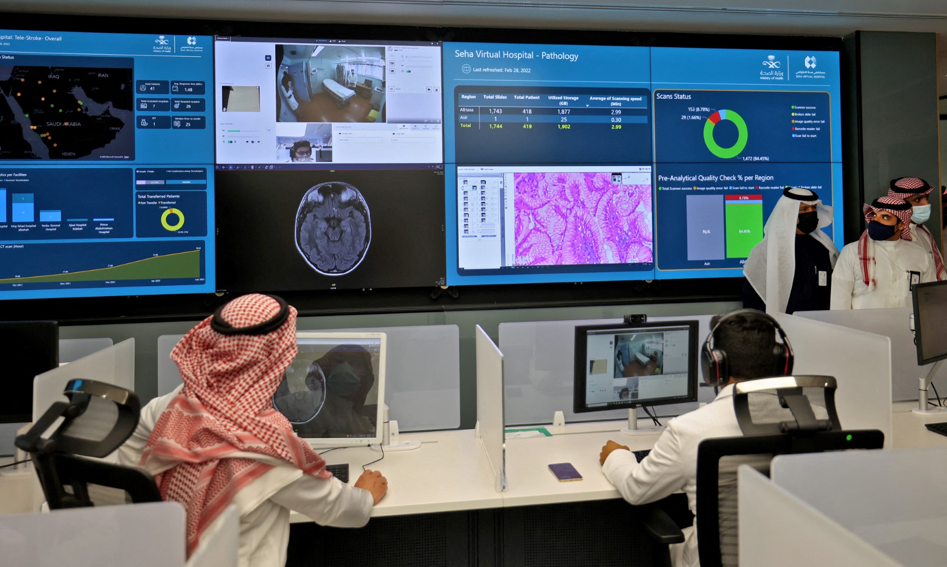 File photo of Saudi health staff work at the newly-inaugurated Seha Virtual Hospital, which uses telemedicine and offers real-time consultations with doctors via video calling, in the Digital City of the Saudi capital Riaydh (AFP)