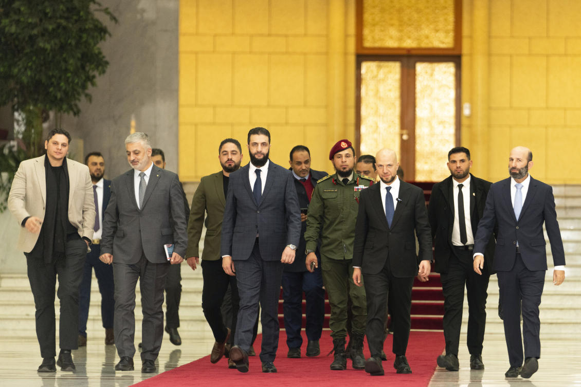 Syria’s de facto leader Ahmad Al-Sharaa, center, meets with Walid Ellafi, third right, Libyan minister of state for communication and political affairs, in the presidential palace in Damascus on Dec. 28, 2024. (AP)