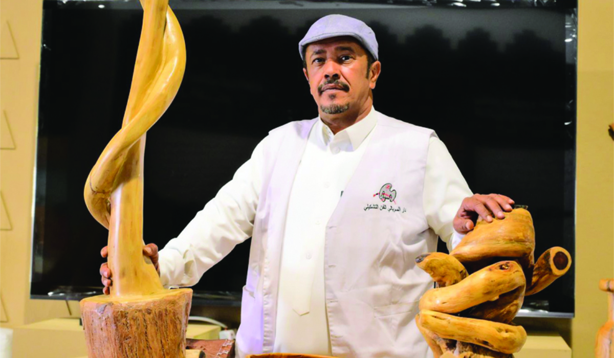 Saudi craftsman Abdulrahman Al-Zahem is best known for his depictions of camels and traditional tools. (SPA)