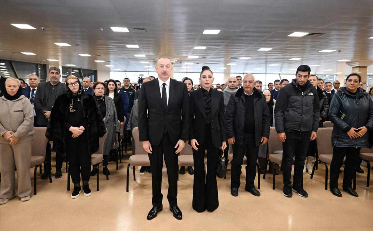 Azerbaijan's President Ilham Aliyev and his wife Mehriban Aliyeva attend a funeral ceremony for those who died when Azerbaijan Airlines Flight J2-8243 crashed near the Kazakh city of Aktau, at Heydar Aliyev International Airport outside Baku, Azerbaijan December 29, 2024. (Reuters)