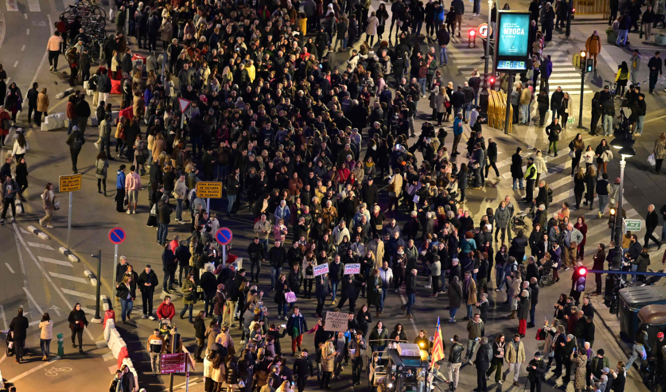 Protesters march to demand resignation of Valencian regional president Carlos Mazon over his handling of October floods, in Valencia on December 29, 2024. (AFP)
