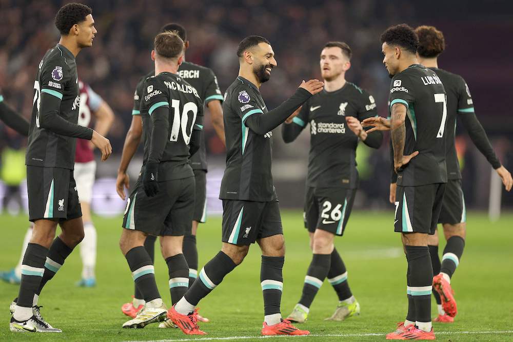 Liverpool’s Egyptian striker Mohamed Salah celebrates scoring the team’s third goal during the English Premier League match against West Ham United at the London Stadium on Dec. 29, 2024. (AFP)