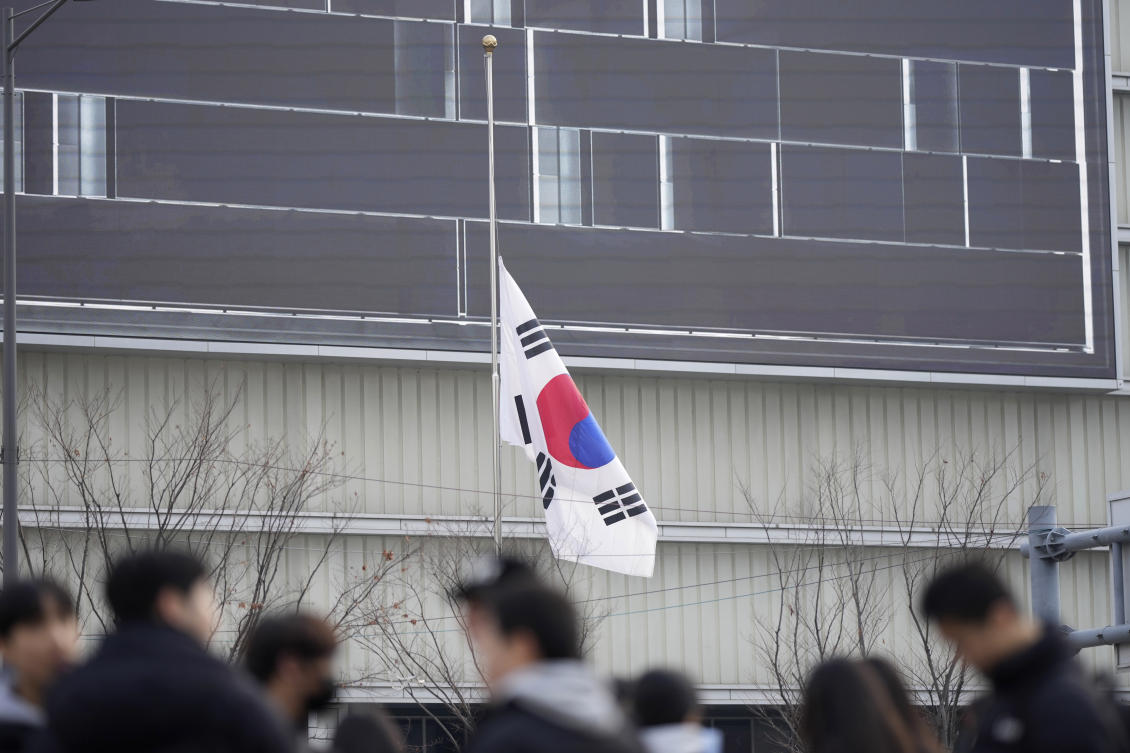 Flags flew at half-mast on Monday as South Korea mourned 179 people killed in the worst plane crash on its soil. (AP)