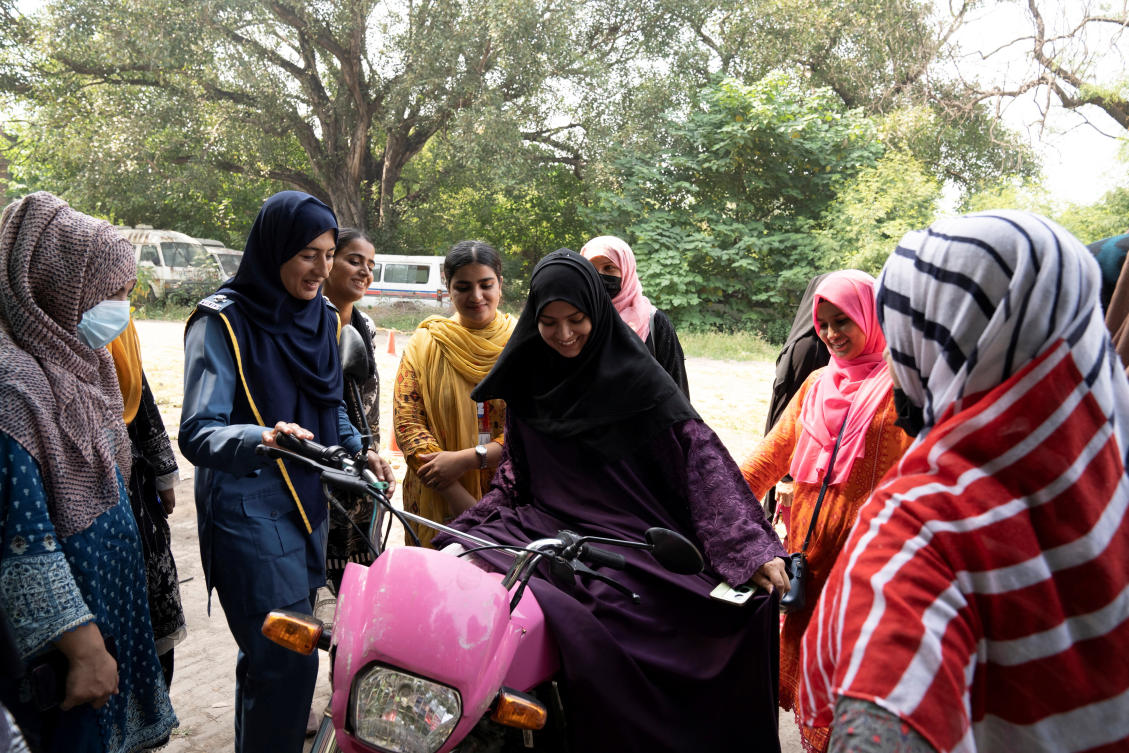 Humaira Rafaqat, a senior traffic warden, teaches women how to ride a bike during a training session as part of the ‘Women on Wheels’ program organized by the traffic police department in Lahore, Pakistan on Oct. 1, 2024. (Reuters)